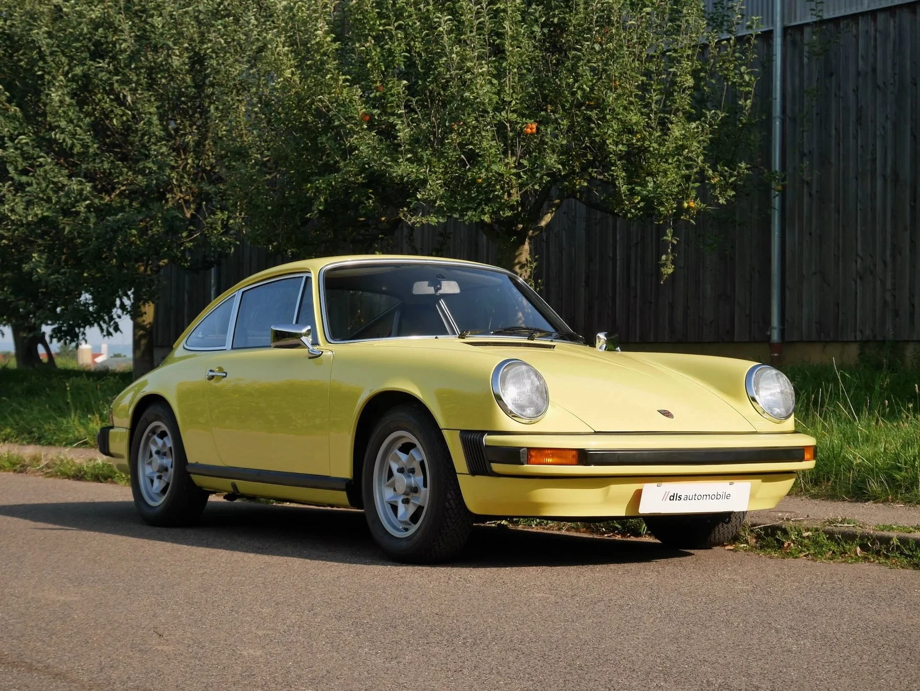 Yellow 1974 Porsche 911 S, front three-quarter exterior view